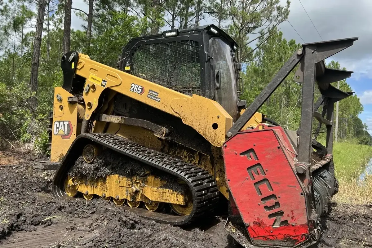 TreeShop CAT 265 forestry mulcher fueling up before a land clearing job in Central Florida
