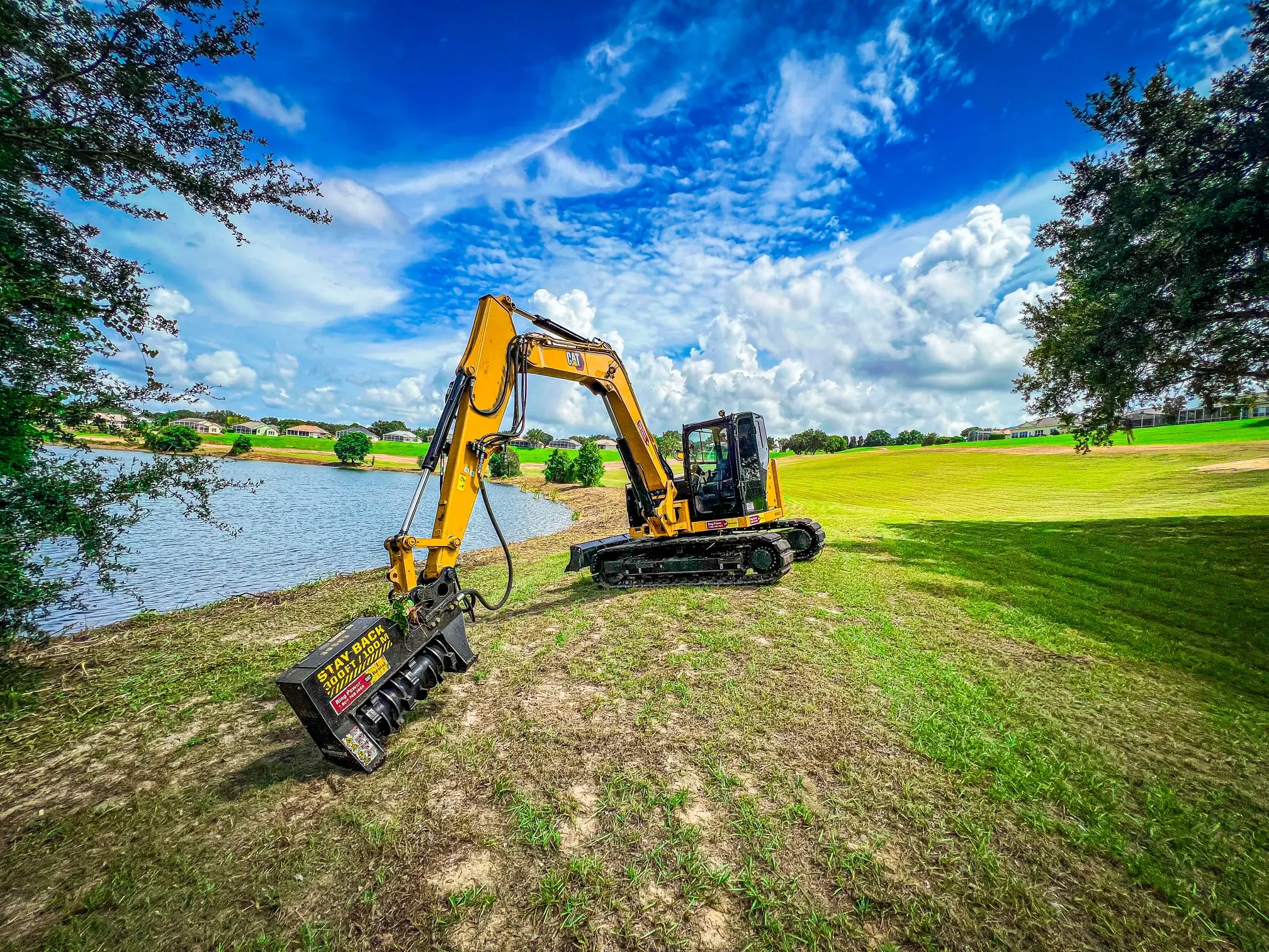CAT 309 excavator with Diamond forestry mulching head