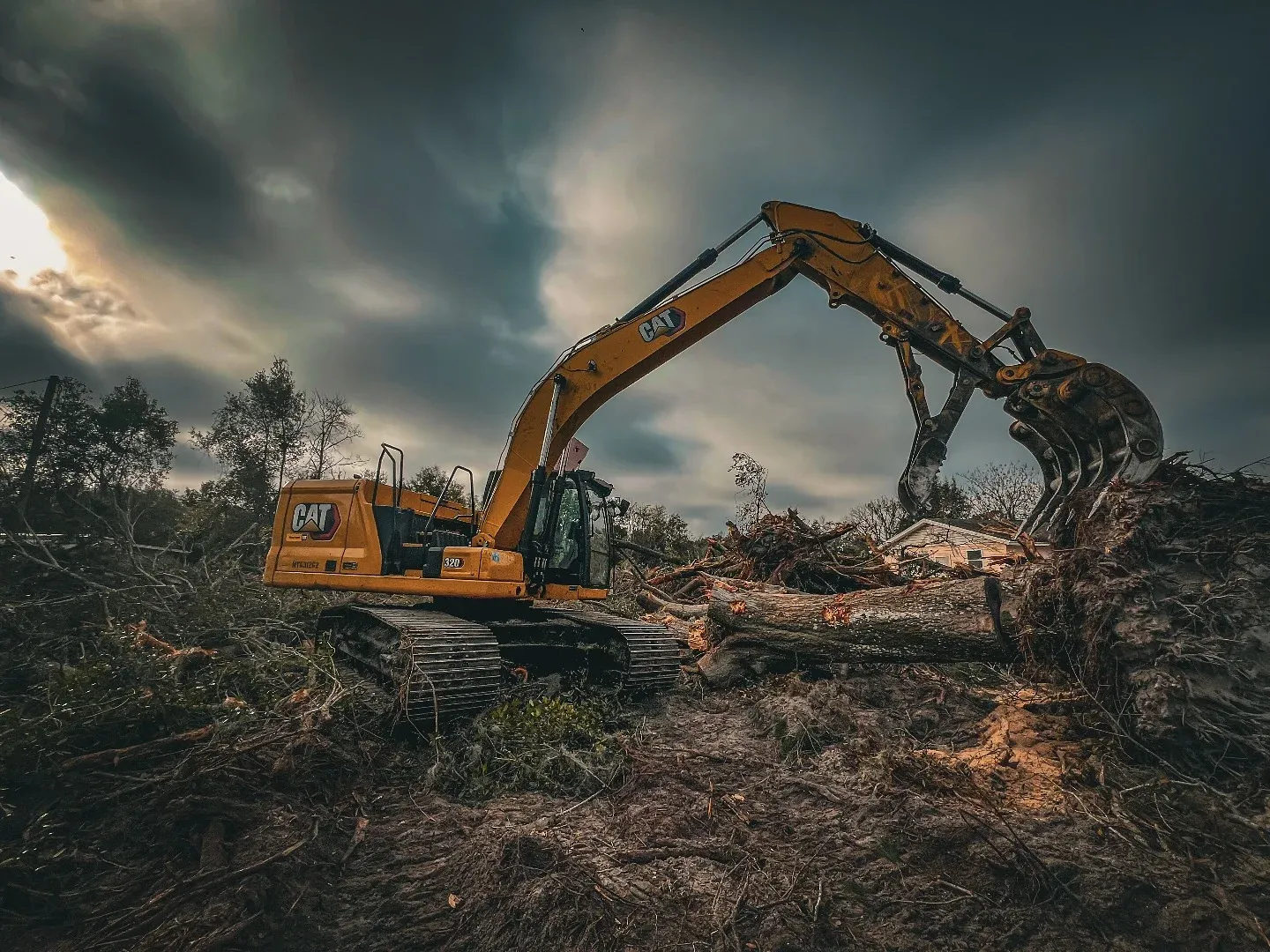 Precision site clearing by TreeShop — selective tree removal with CAT equipment in Central Florida