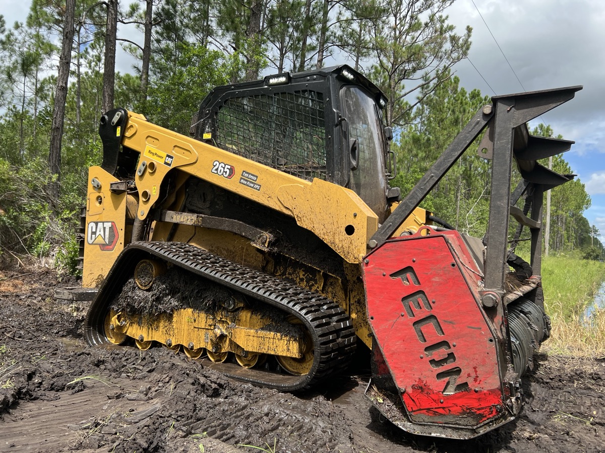 CAT 299D3 forestry mulching equipment working in Central Florida near Palm Bay